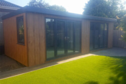 The outside of a wooden garden studio in Bristol